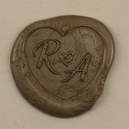Heart-shaped wax seal with initials Heart-shaped wax seal with initials